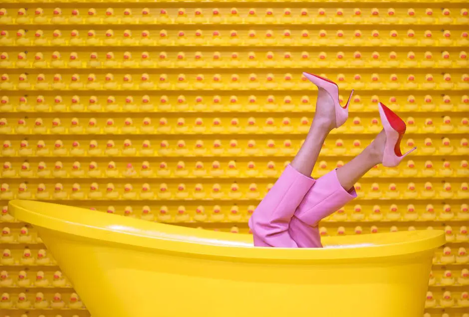 A child playing with colorful bath toys in a bathtub