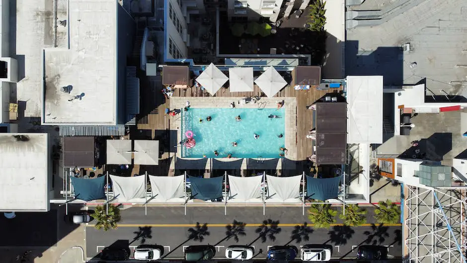View of Pendry San Diego's rooftop pool with city skyline in the background