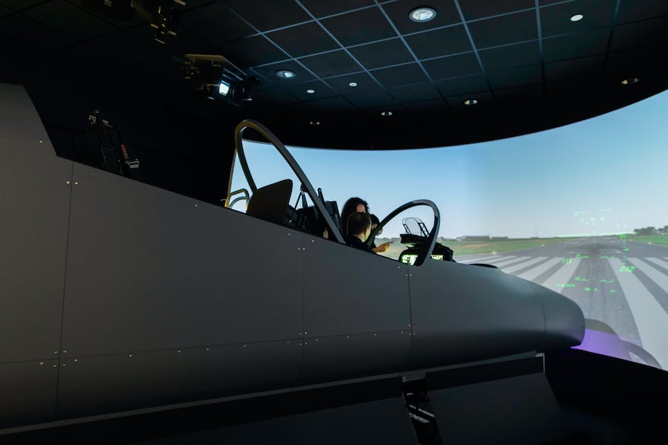 A photo of people in flight simulators at Flightdeck Flight Simulation Center, experiencing an exciting aerial adventure.