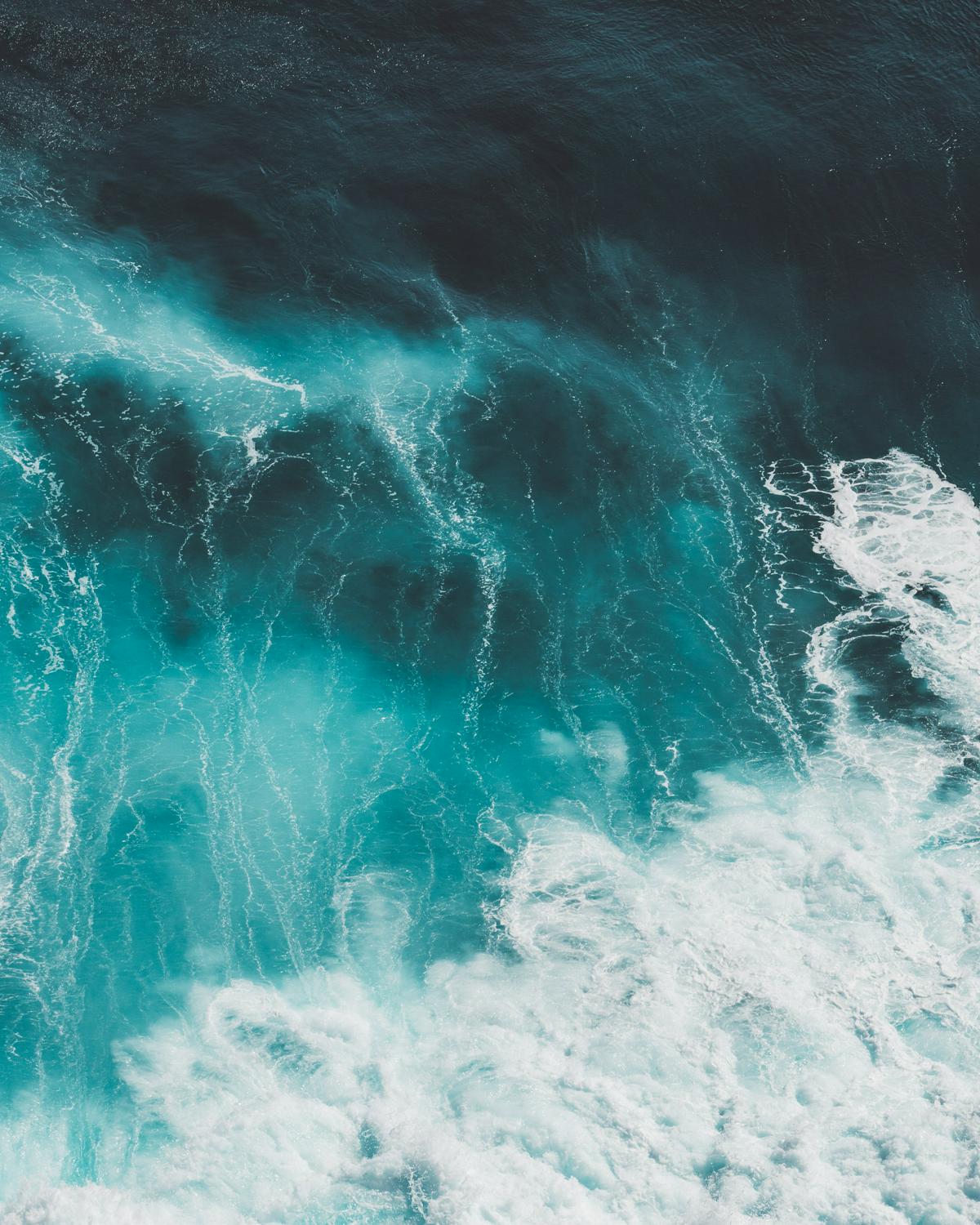 An image of the ocean water near the coast of La Jolla, with varying shades of blue and green reflecting the different depths and temperatures of the water.